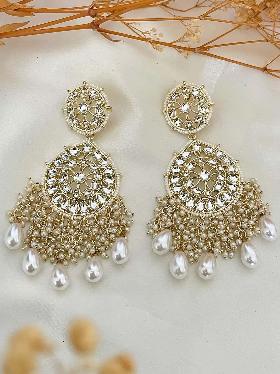 Sreenithi In Kundan Chandbali And Pearls Earrings